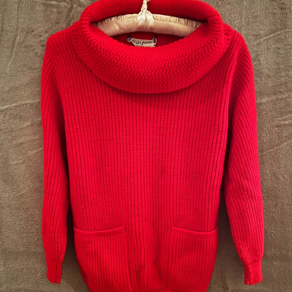 A vintage Peter Freuna cowl neck sweater in bright red and  size small..